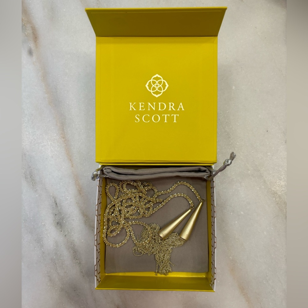 Kendra Scott gold necklace. In original box. Perfect gift! Phara lariat style.